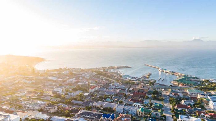 Aerial view of Mossel Bay harbour, Santos Beach and the Outeniqua mountains